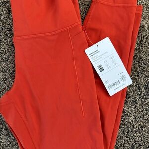 Athleta Transcend Stash  Leggings
